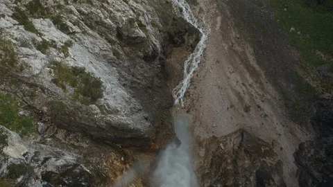 Water falls down a mountain ridge Stock Footage 101903869