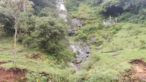 Water falls on the hill. Stock Footage 155761079