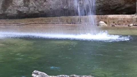 Water falls into the river close-up Video stock 144471144