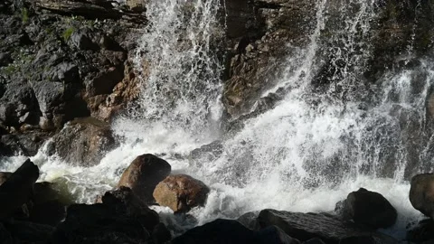 Water falls on rocks in the mountains Stock-Footage 219381659