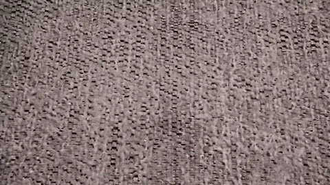 Water falls on a wall covered with small bricks. Stock Footage 113549055