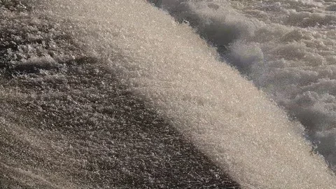 Water of a fast flowing waterfall Stock Footage 122699100