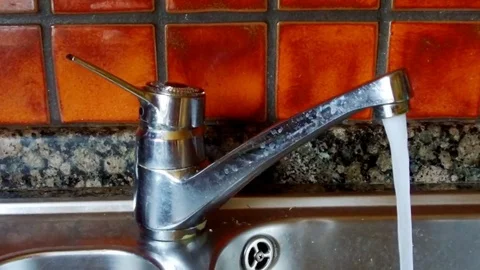 Water faucet are opened Stock Footage 78132970
