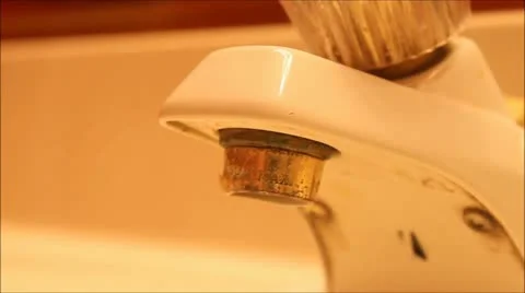 WATER FAUCET DRIP CLOSE UP Stock Footage 12364793