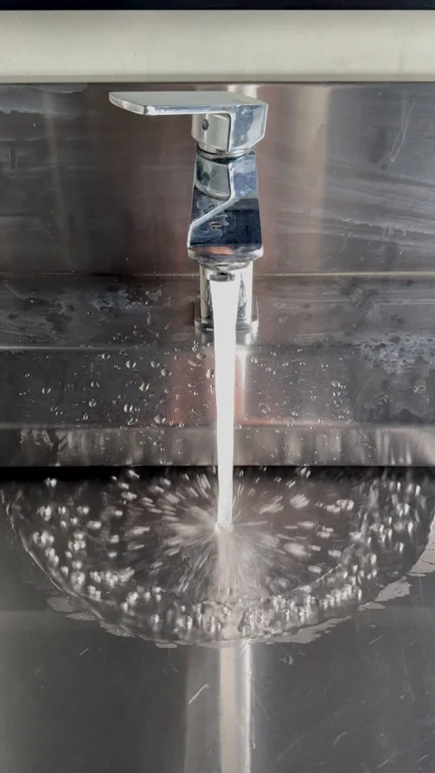 Water faucet splash Stock Footage 337969349
