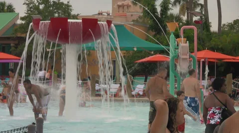 Water Features at Kids Play Area at Water Park with People Stock Footage 30408160