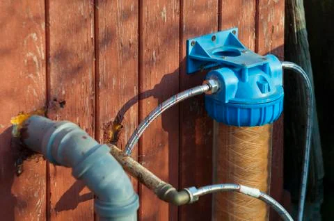 Water filter on a wall 写真素材