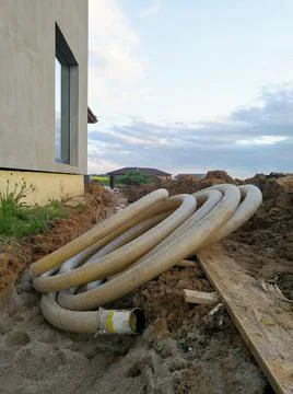 Water filtering drainage pipe in constructions Stock Photos
