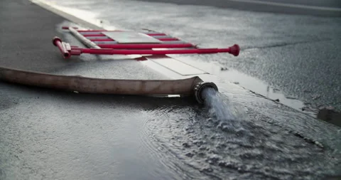 Water from fire hose Stock Footage 318073611
