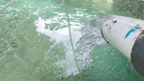 Water flow and aeration system in giant trevally broodstock tank close up Stock Footage 344879360