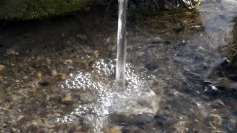 Water flow and splash at mossy stone background Stock-Footage 156324328