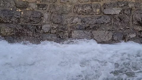 Water flow and stone wall Stock Footage 151652640