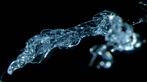 Water flow on black Stock Footage
