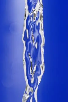 Water flow on blue background Stock Photos
