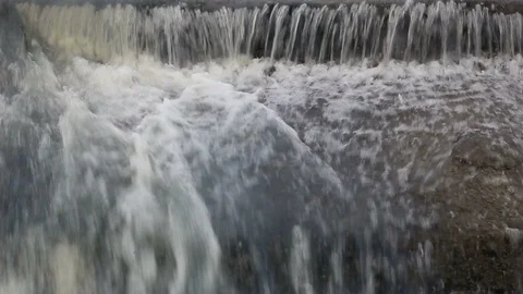 Water flow of dike Stock Footage 97260835