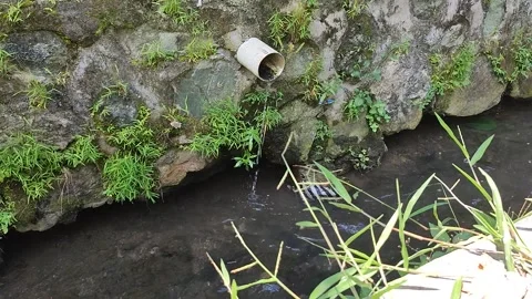 Water flow in the ditch Stock Footage 227809353