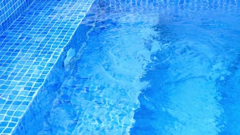 Water Flow Emerging from Pool Floor Filter System Stock Footage 346555732