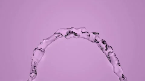 Water flow isolated on a purple background video footage. Видео 276804683