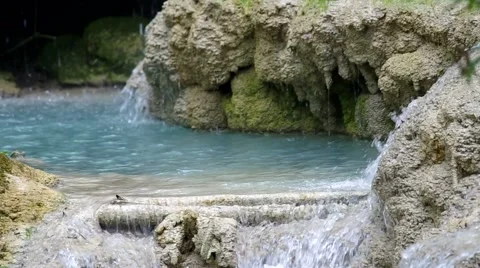 Water flow in lime stone channel Stock Footage 53044244