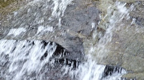 Water flow over the rock Stock Footage 51297680