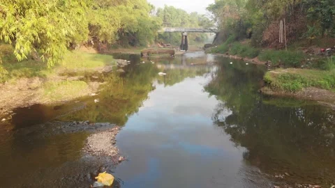 Water flow in the river and the bridge Stock Footage 158463602