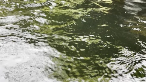 Water flow into the river. -footage Stock Footage 150427698