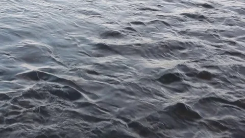 Water flow in the river at sunset Stock Footage 73685404