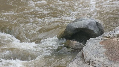 Water flow in the rocky stream Stock Footage 94153160