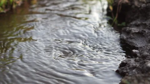 The water flow rotates in the gutter Video stock 263835030
