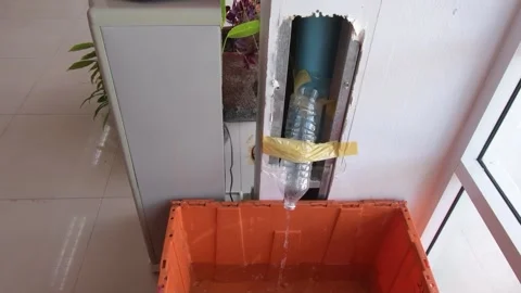 Water flow from  sewer pipe in the office. Stock Footage 245939012
