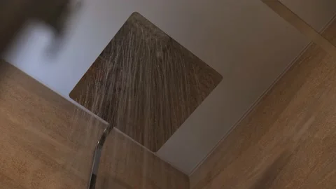 Water flow from shower head in bathroom. rain shower in shower room. shower h Stock Footage 197109012