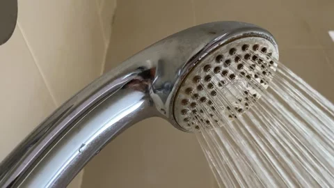 Water flow from shower head in bathroom Stock Footage 301180898