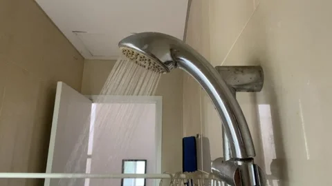 Water flow from shower head in bathroom Stock Footage 301180981