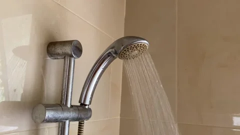 Water flow from shower head in bathroom Stock Footage 301181830