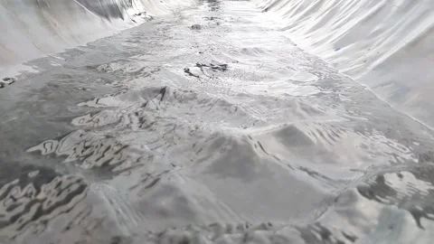 Water flow in a small ditch Stock Footage 281906833