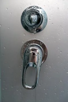 Water flow switch in the shower Stock Photos