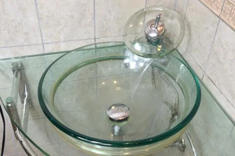 Water Flow from Tap Stock Photos