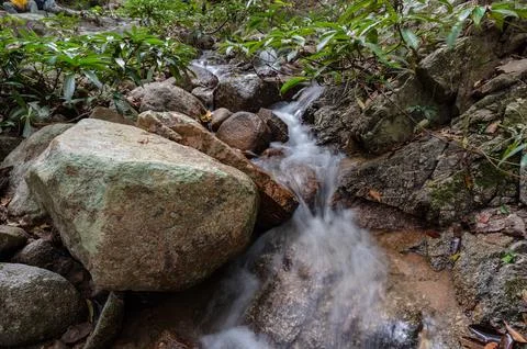 Water flow on Tat Moel Waterfall at khuntan mountain national park.the Khun T Stock Photos