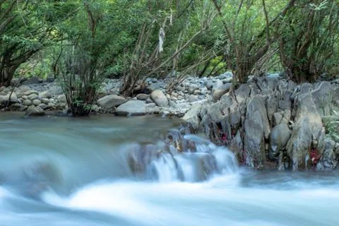 The water flow through the rocks in a stream at Wang Nan Pua , Nan in Thailan Stock Photos