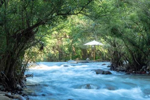 The water flow through the rocks in a stream at Wang Nan Pua , Nan in Thailan Stock Photos