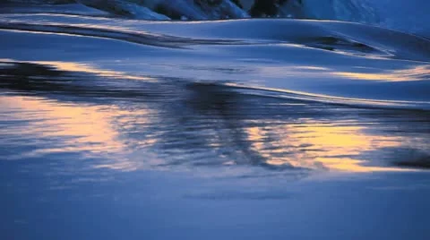 Water flow to waterfall in sunset Stock Footage 10830186