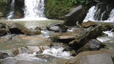 Water flow waterfalls of a mountain river in the forest, Carpathians, Ukraine Stock Footage 260802665
