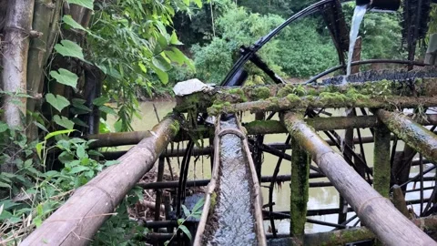 Water flowing into bamboo architecture trough in Lang Son. Stock Footage 341482747