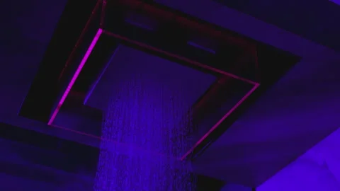 Water flowing from beautiful modern designed, luxury built in shower in bathroom Stock Footage 245231064