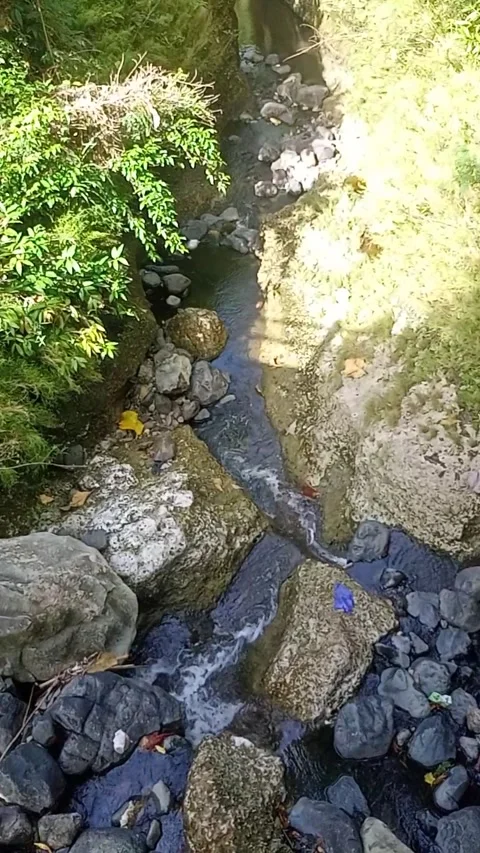 Water flowing between the rocks 3 Stock Footage 207950532