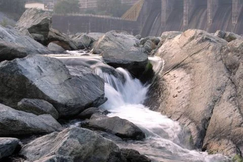 Water flowing between the rocks Stock Photos