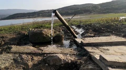 Water flowing from a burst pipe Stock-Footage 156327003
