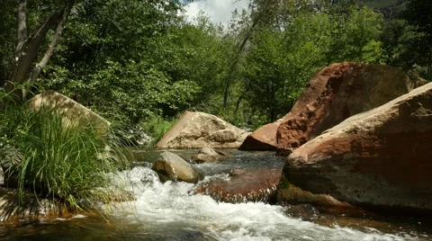 Water flowing in a cool mountain stream Stock Footage 51221785
