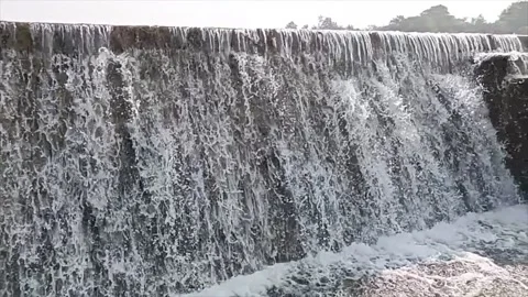 Water flowing from the dam Stock Footage 166165817
