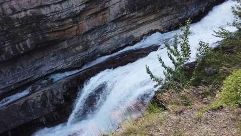 Water flowing down Cameron falls near Waterton Alberta Stock Footage 139942746